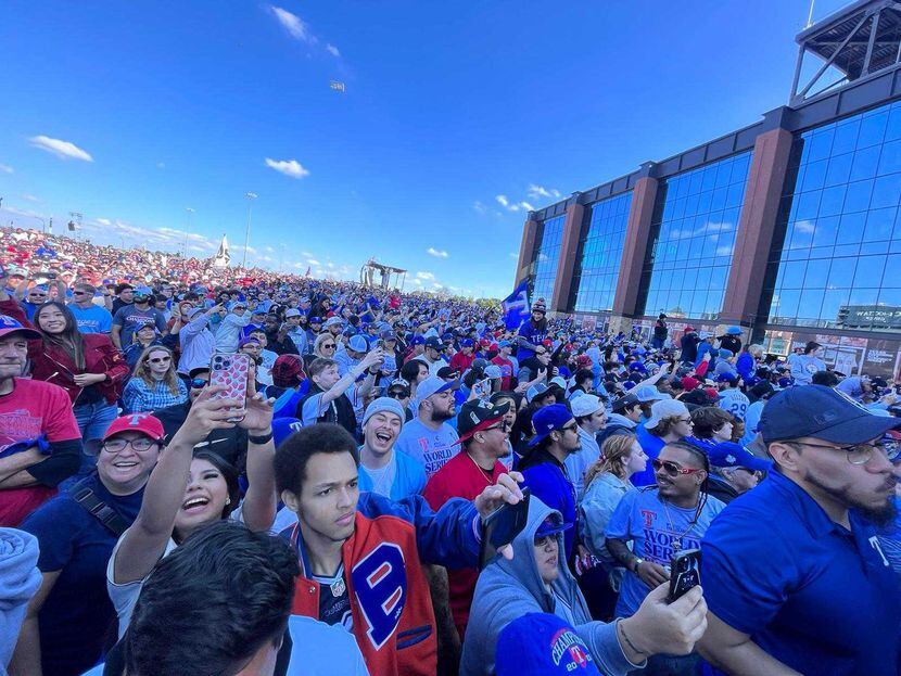 Fans outside Texas Live! following the post-Rangers World Series parade ceremony Friday,...