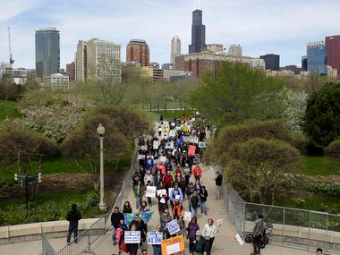 Demonstrators attend the March for Science in Chicago, April 22, 2017. Thousands of...