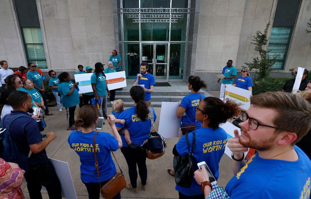 People rally with the Strong Schools Strong Dallas coalition outside the DISD headquarters...