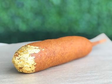 The corn dog crusted with 24-karat gold costs $24 at CornDog With No Name, a restaurant in Dallas.