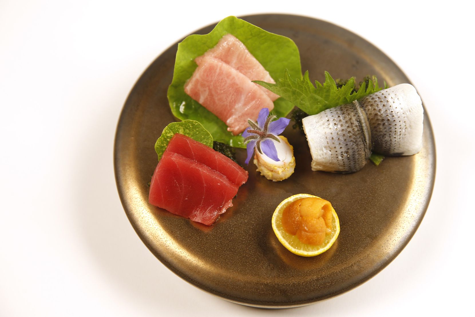 The Chef Is Grilling Sashimi Sushi With Spray Gun Stock Photo