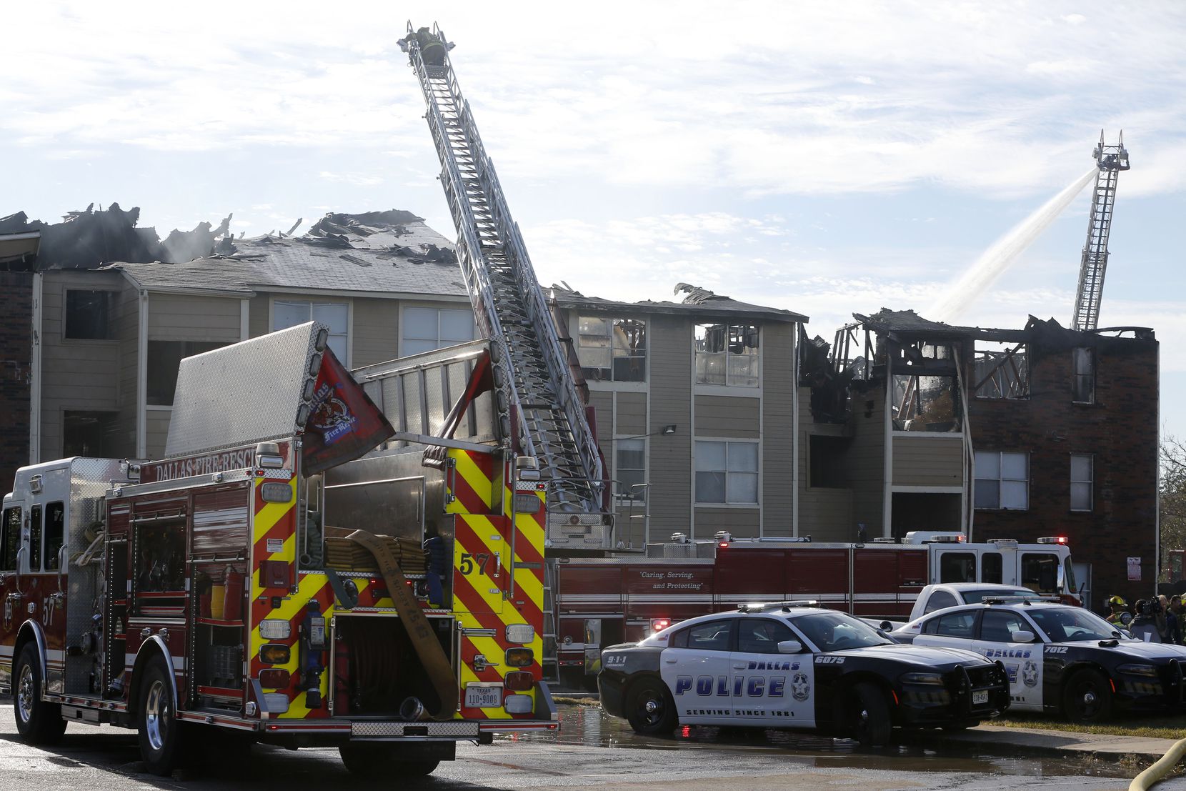 More than 50 firefighters were on the scene at the early morning apartment fire at the...
