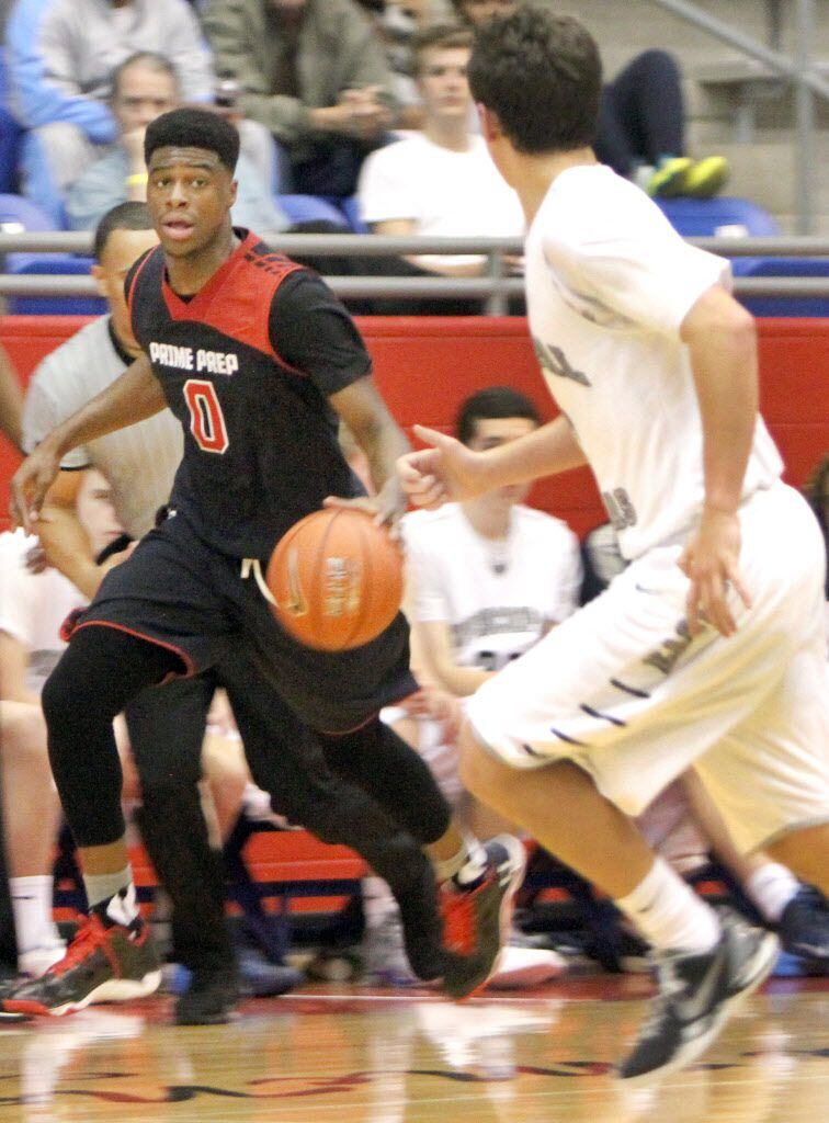 Prime Prep senior Emmanuel Mudiay (0) looks for a teammate to pass to as he keeps an eye on...