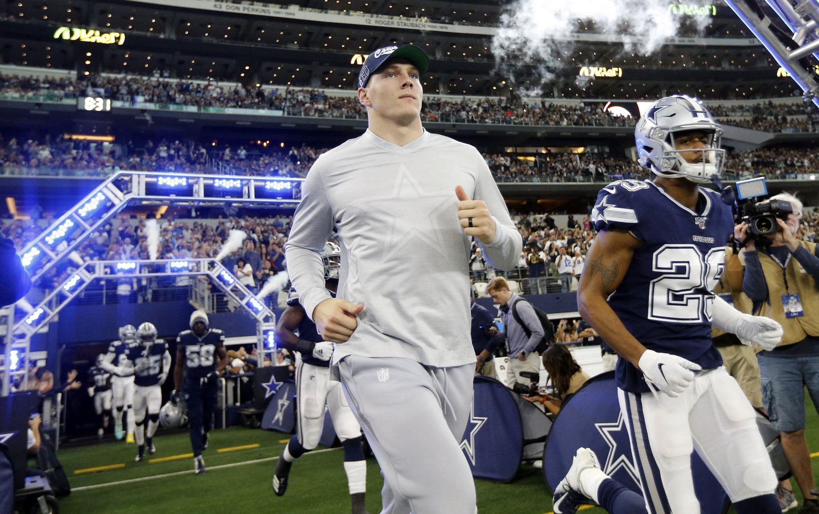 FILE - Leighton Vander Esch runs onto the field during pregame introductions at AT&T Stadium...