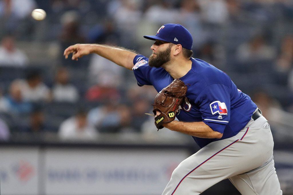 Texas Rangers starting pitcher Lance Lynn delivers during the second inning of the team's...
