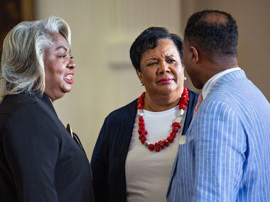 State Rep. Barbara Gervin-Hawkins, left, chats with State Rep. Yvonne Davis and State Rep....
