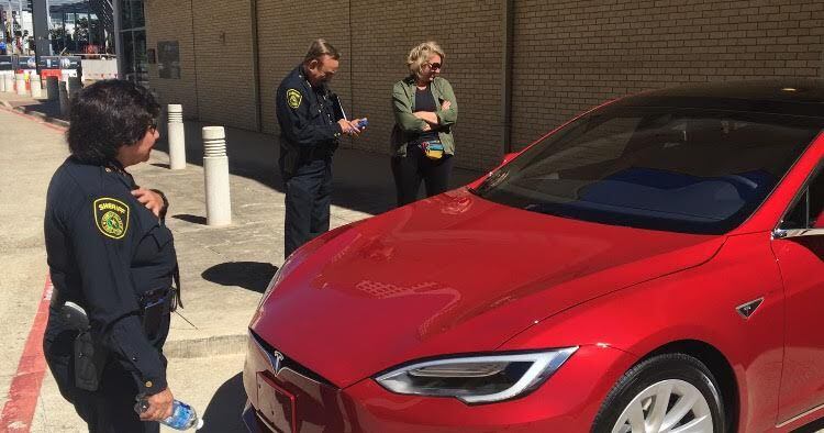 Dallas County Sheriff Lupe Valdez receives an early birthday surprise red Tesla sedan from...