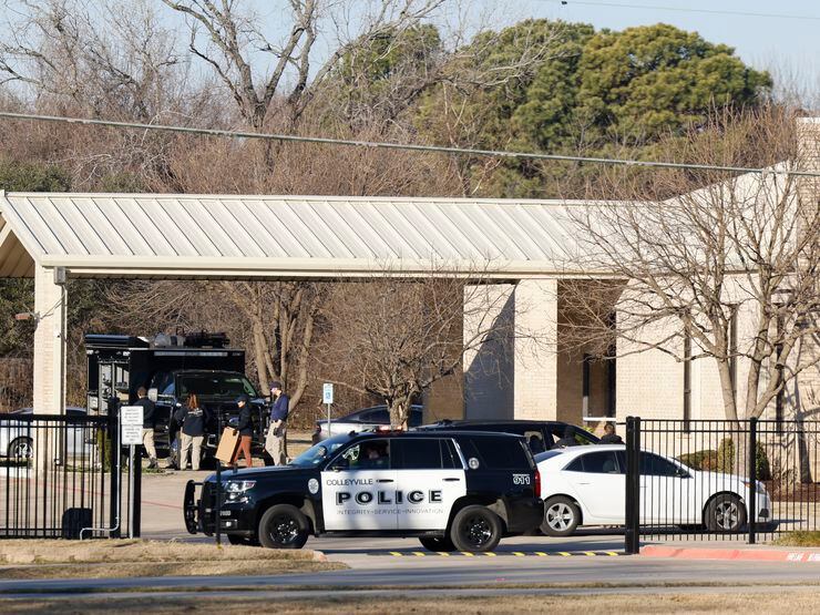 FBI members are seen inside the Congregation Beth Israel synagogue, a day after an 11 hour standoff with FBI and SWAT that ended with hostage taker dead at on Sunday, Jan. 16, 2022 in Colleyville, TX.