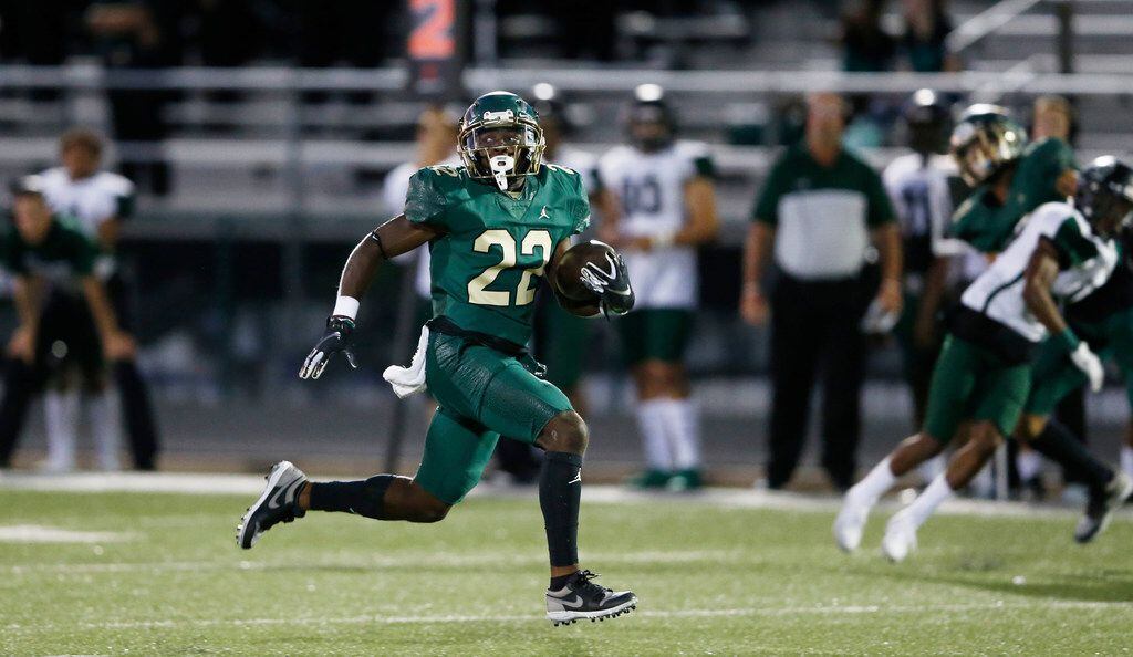 DeSoto's Jyison Brown (22) breaks for a long rushing touchdown in a game against Mansfield Lake Ridge during the first half of play at Eagle Stadium in DeSoto, Texas on Friday, September 27, 2019. (Vernon Bryant/The Dallas Morning News)