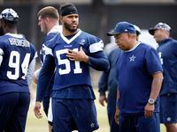New Dallas Cowboys linebacker Anthony Barr (51) visits with his old coach, Cowboys senior...