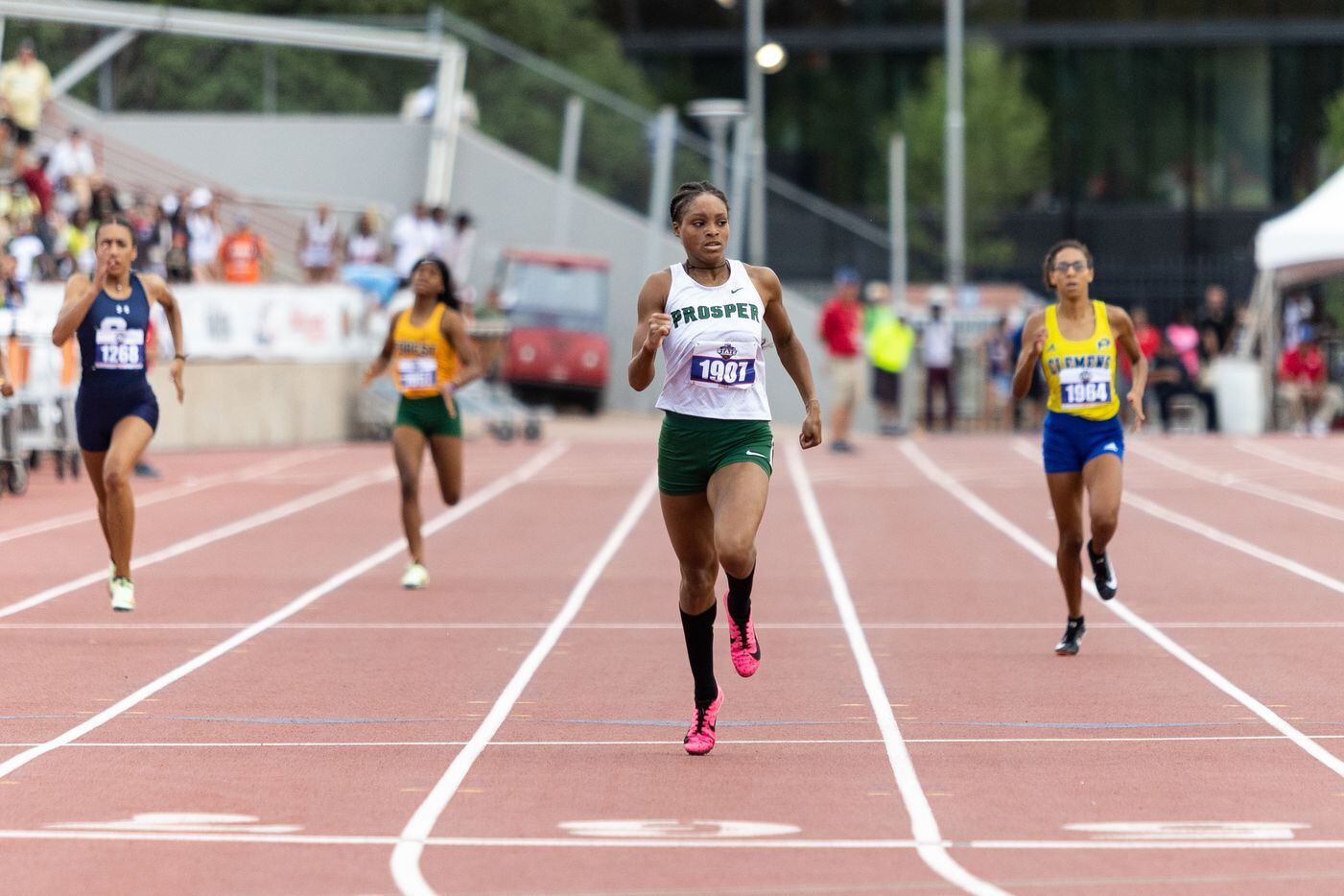 Lauren Lewis of Prosper races in the girls’ 400-meter dash at the UIL Track & Field State...