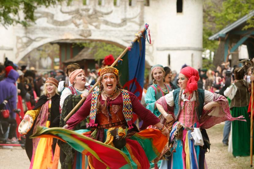 The huge cast of performers and characters parade through Scarborough Renaissance Festival...