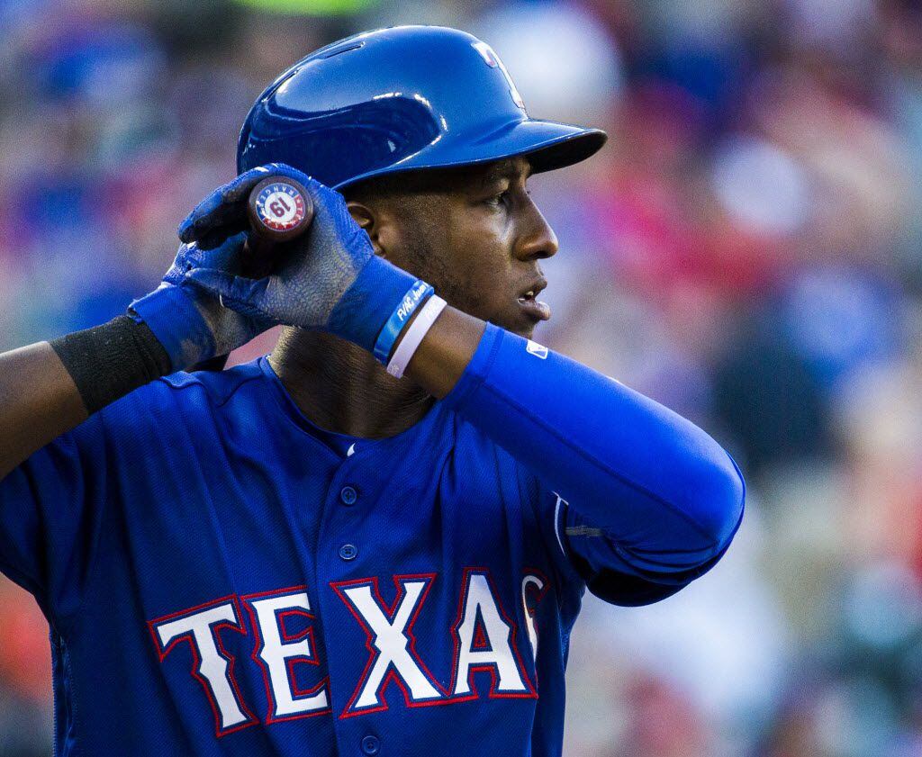 Texas Rangers first baseman Jurickson Profar (19) bats during the first inning of their game...