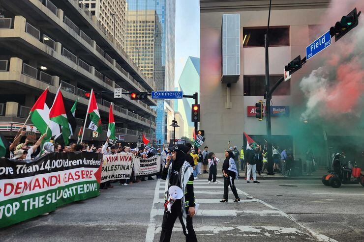 More than a hundred pro-Palestinian demonstrators marched through downtown Dallas on Tuesday...