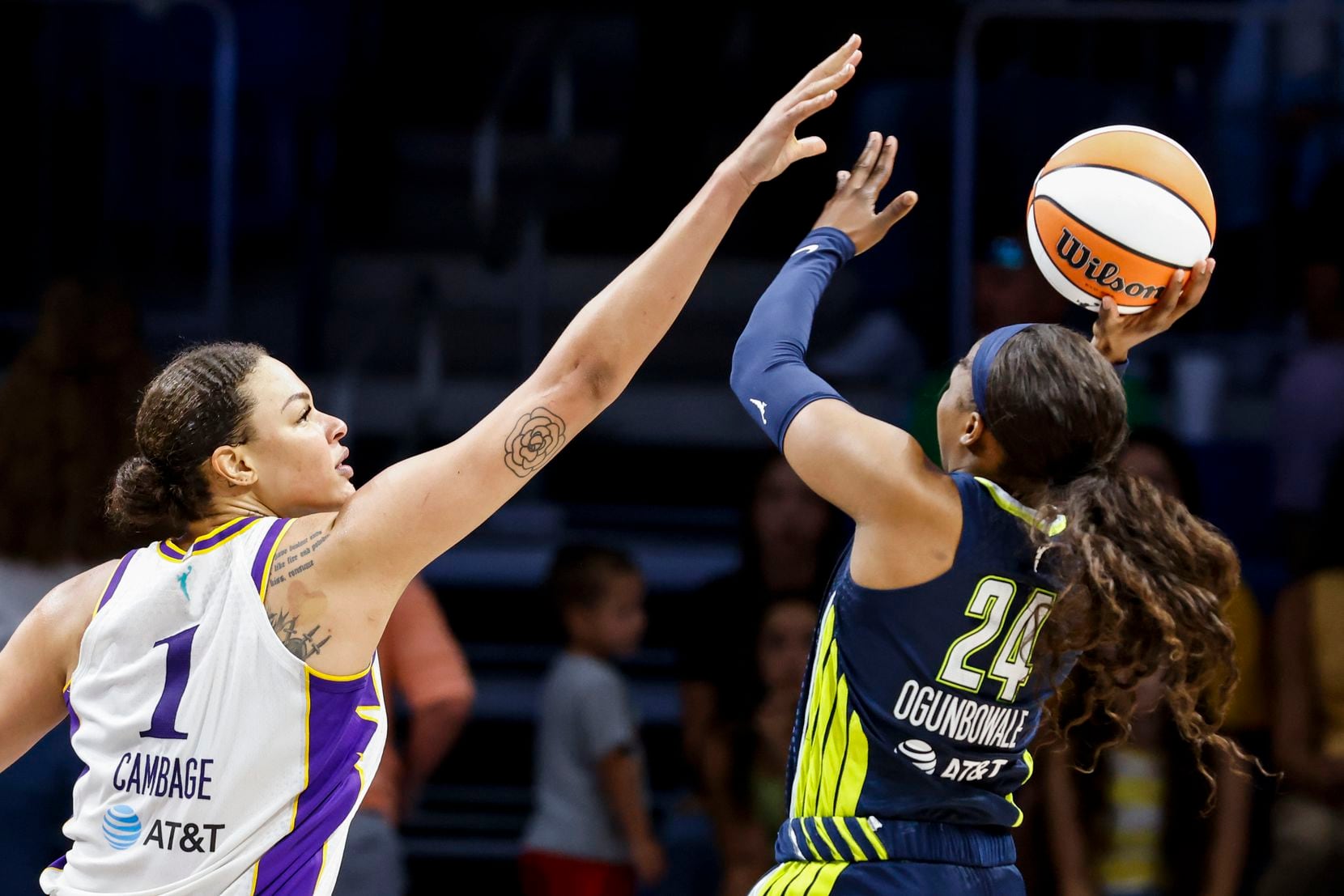 Los Angeles Sparks center Liz Cambage (1) reaches to block a shot of Dallas Wings guard...