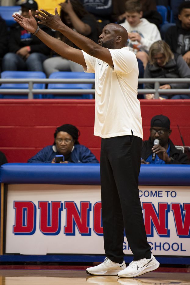 Kimball Head Coach Nick Smith urges his players to play defense during Kimball's Thanksgiving Hoopfest game against North Little Rock at Sandra Meadows Memorial Arena in Duncanville, Texas on Friday, November 26, 2021. (Emil Lippe/Special Contributor)