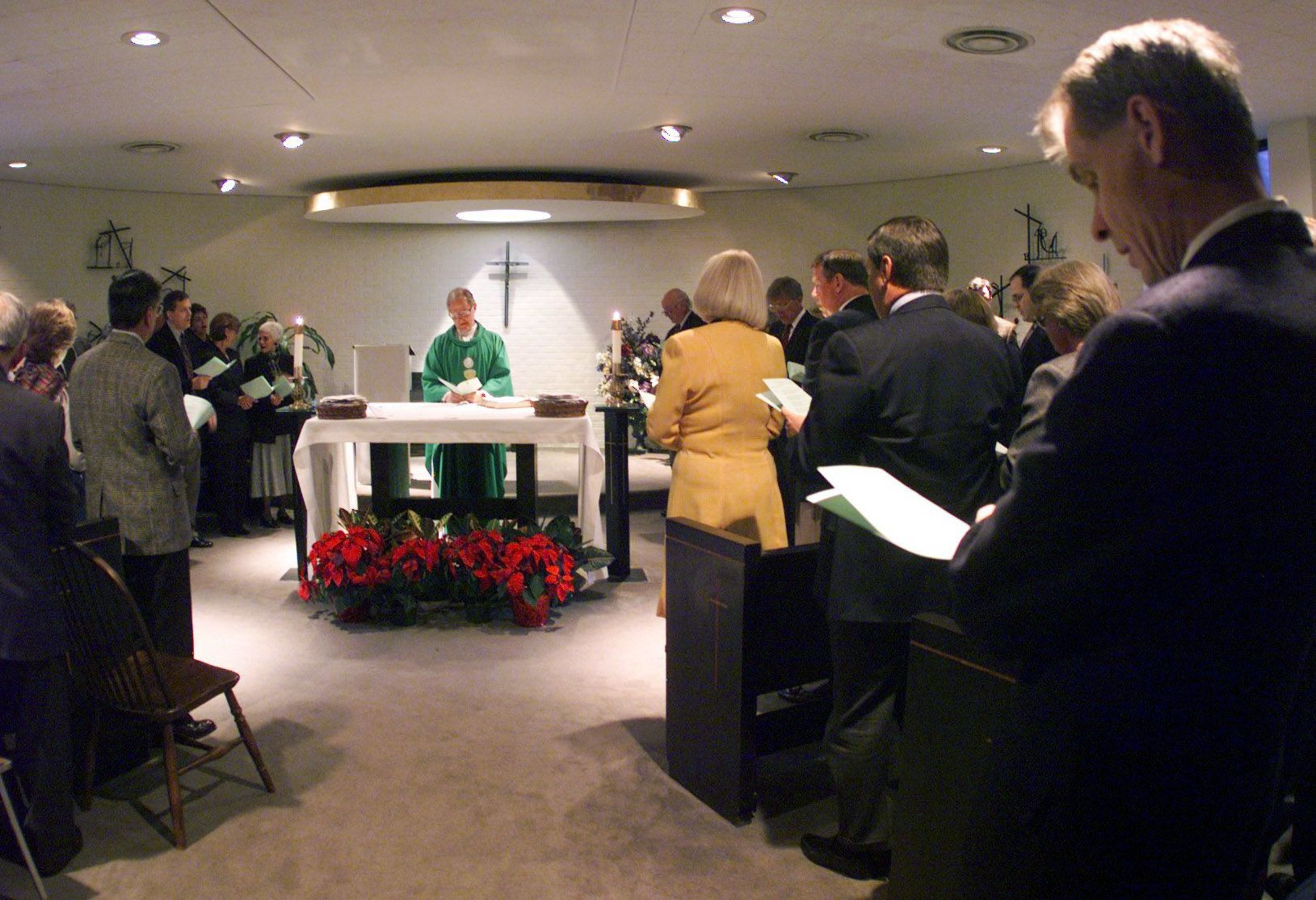 The Rev. Philip Postell conducts the Mass of Thanksgiving For Friendship in the Chapel at...