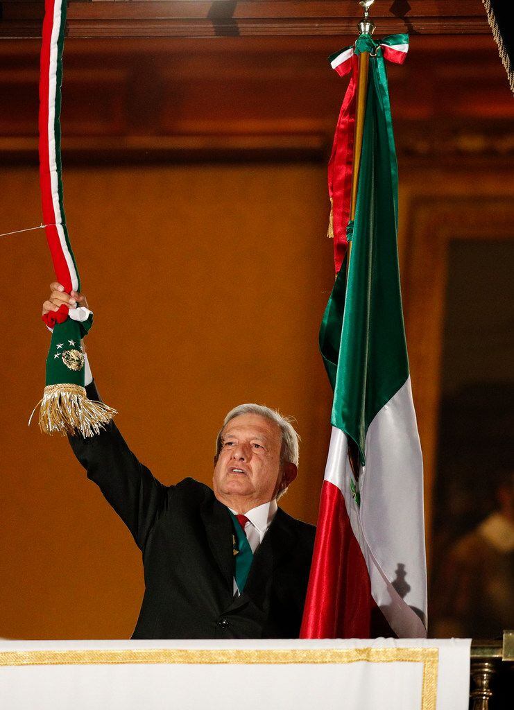 President Andres Manuel Lopez Obrador rings the bell after giving the annual independence...