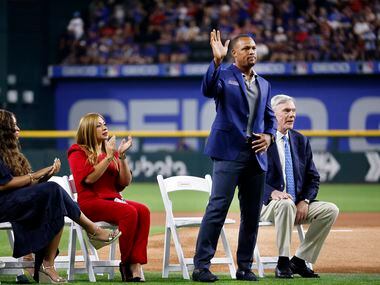 Former Texas Rangers third baseman Adrian Beltre (left) waves to fans after his Texas...
