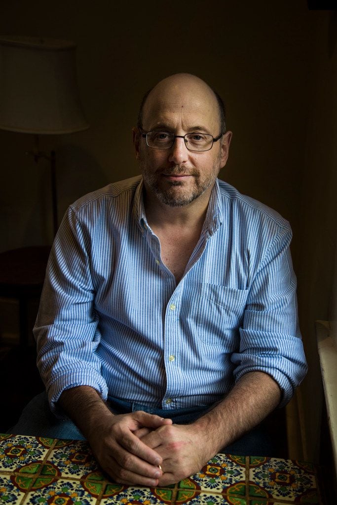 Author Kurt Eichenwald poses for a photograph at Crooked Tree Coffee House in Dallas. 