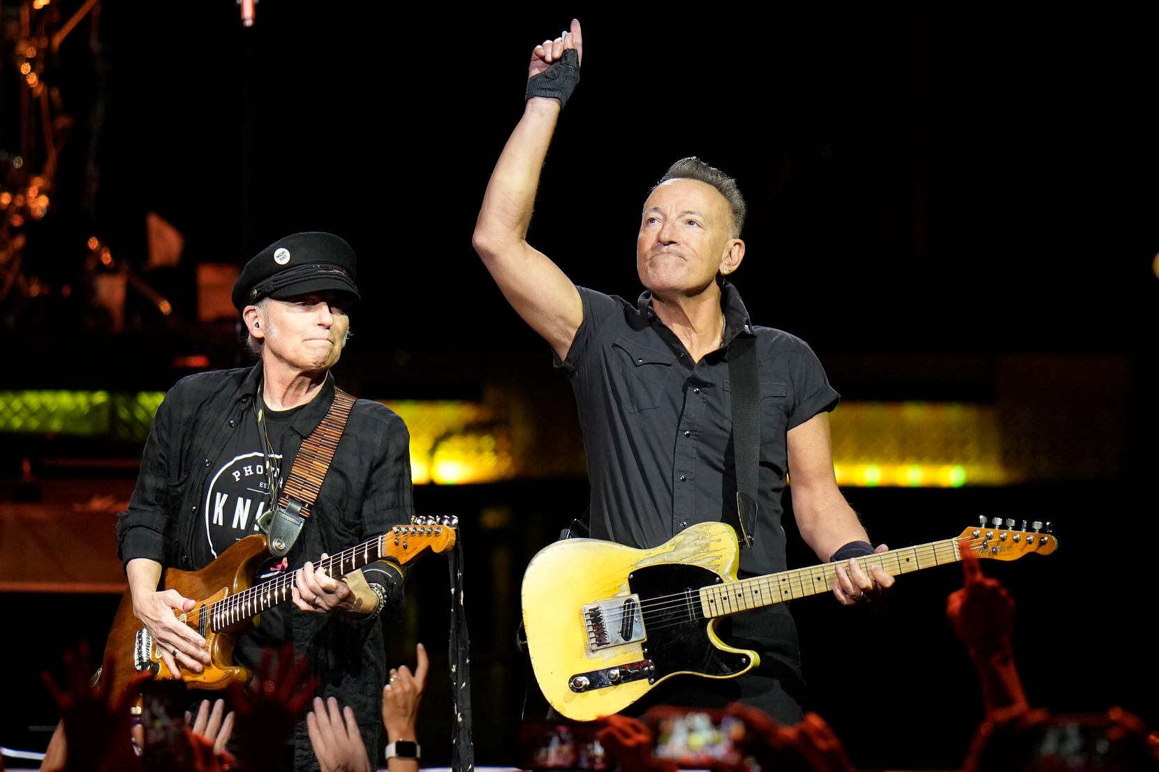 Singer Bruce Springsteen, right, and E Street Band member Nils Lofgren will perform at 7:30...