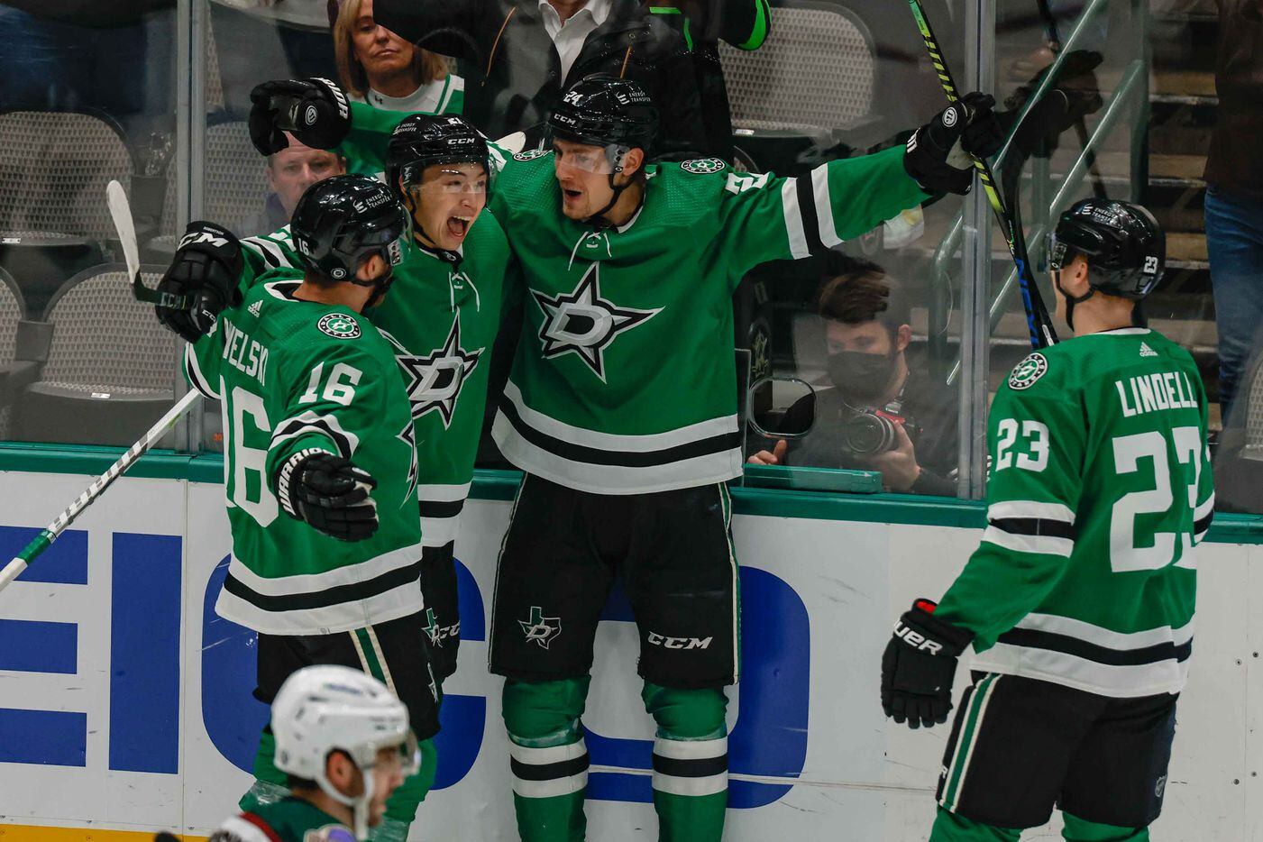 Dallas Stars left wing Roope Hintz (24) celebrates his goal against the Arizona Coyotes with his teammates left wing Jason Robertson (21), center Joe Pavelski (16) and defenseman Esa Lindell (23) during first period at the American Airlines Center in Dallas on Monday, December 6, 2021. (Lola Gomez/The Dallas Morning News)