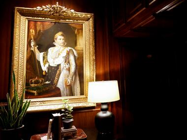 A portrait of Napoleon painted by François Gérard hangs in the City Hall Bar room of...