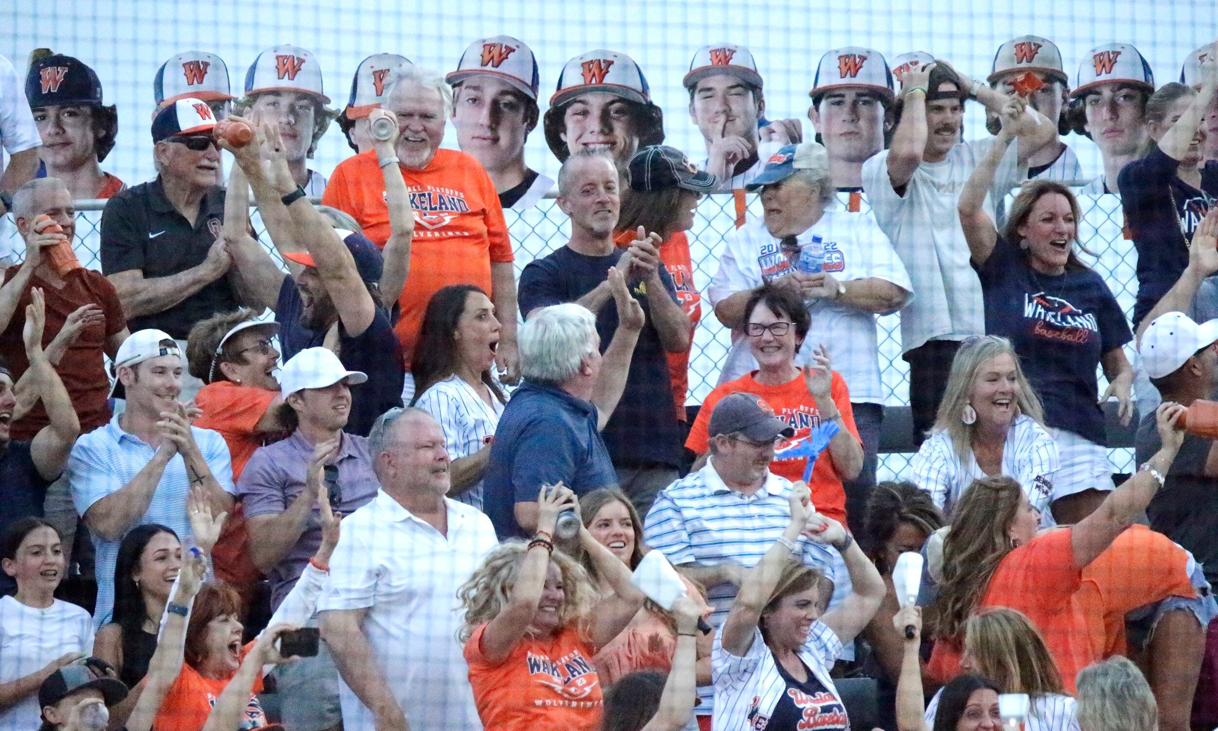 Wakeland fans react to a three run home by Owen Cassano in the third inning as Reedy High...