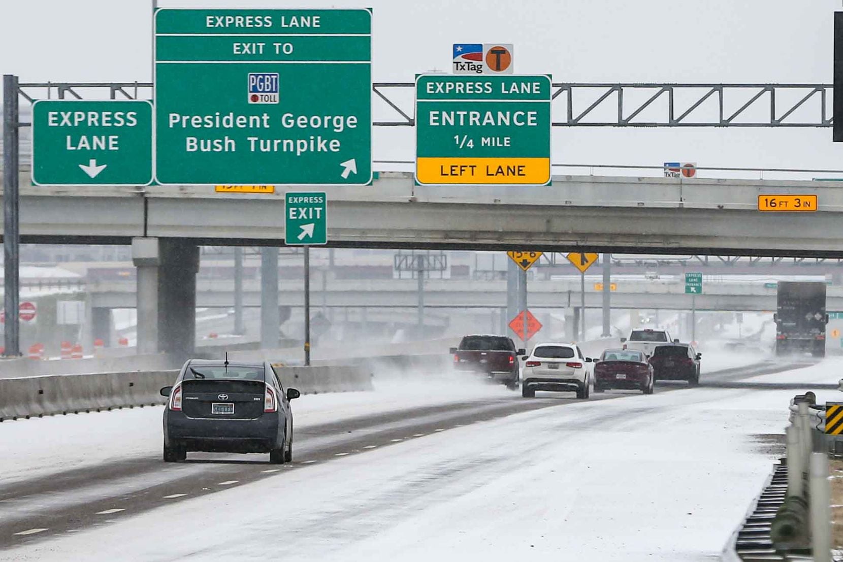 Traffic on Texas 114 TEXpress near MacArthur Blvd Winter flurries arrive in Irving on...