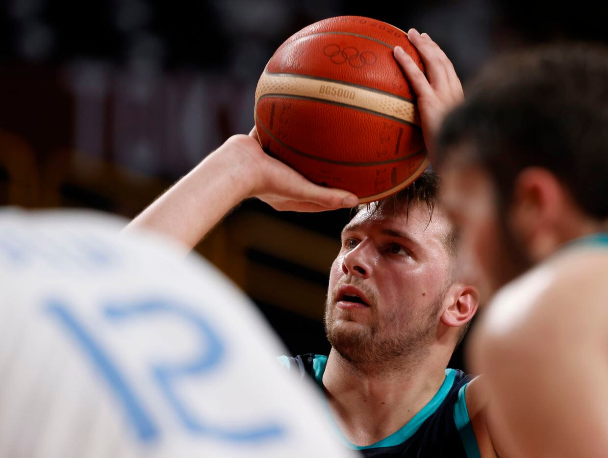Slovenia’s Luka Doncic (77) shoots a free throw in a game against Argentina in the second half of play during the postponed 2020 Tokyo Olympics at Saitama Super Arena on Monday, July 26, 2021, in Saitama, Japan. Slovenia defeated Argentina 118-100. (Vernon Bryant/The Dallas Morning News)