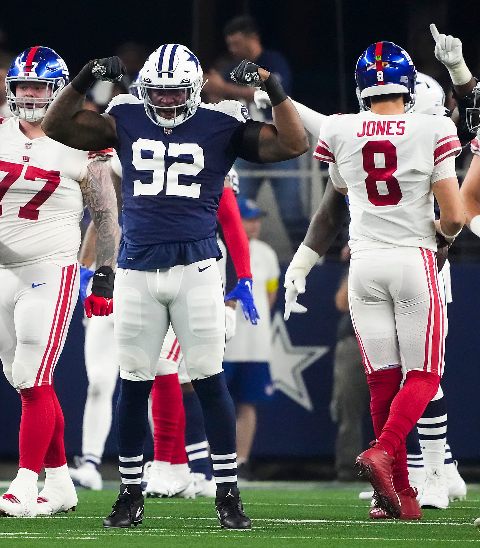 Dallas Cowboys defensive end Dorance Armstrong (92) celebrates after sacking New York Giants...