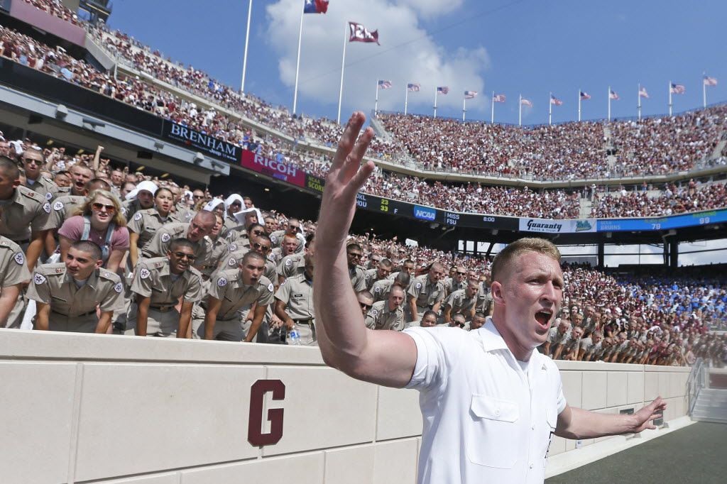 An Aggie yell leader leads the cheers during the UCLA Bruins vs. the Texas A&M Aggies NCAA football game at Kyle Field in College Station, Texas on Saturday, September 3, 2016. (Louis DeLuca/The Dallas Morning News)