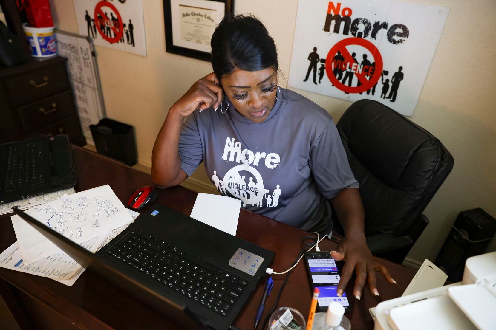 Patricia Allen checks in by phone with Gardana Wright, who lost her son Noel King to gun...