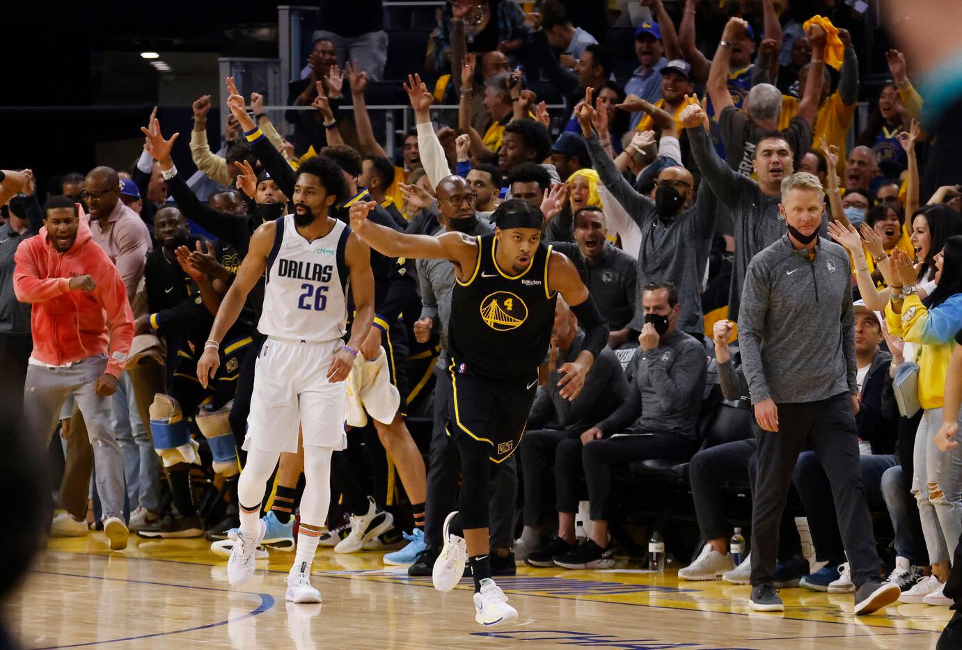Golden State Warriors guard Moses Moody (4) celebrates after making a three pointer as...
