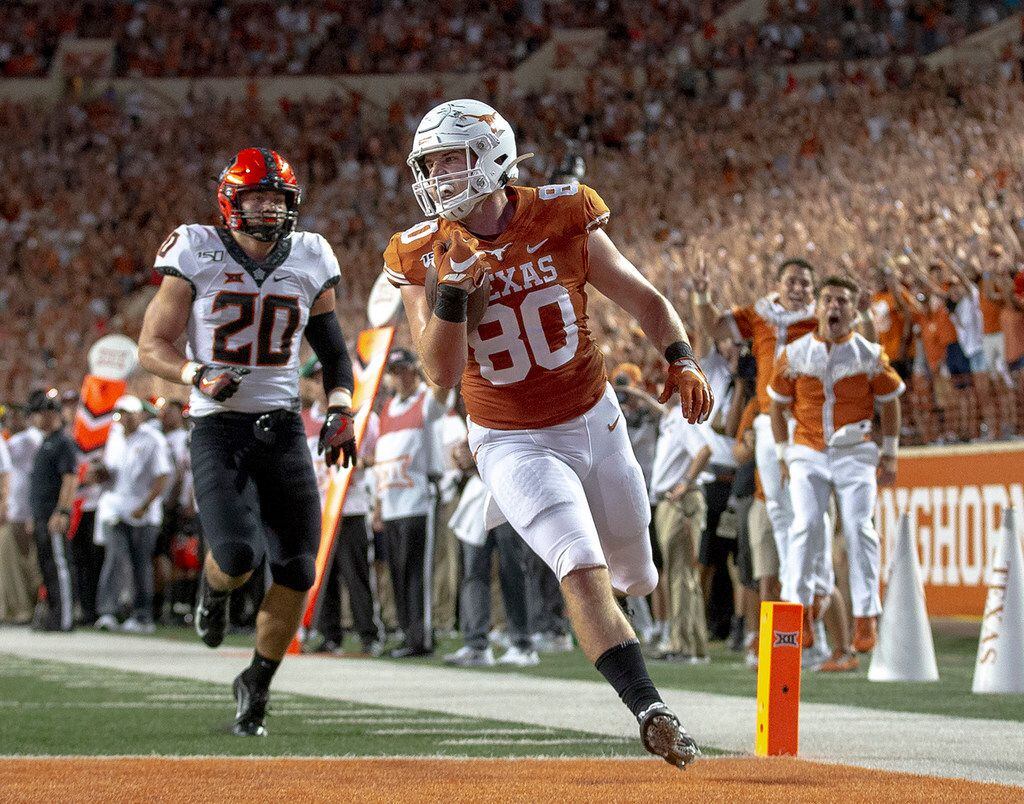 Texas tight end Cade Brewer (80) scores a touchdown on a 25-yard pass reception against Oklahoma State during the third quarter on Saturday, Sept. 21, 2019, at Royal Texas Memorial Stadium in Austin, Texas. The host Longhorns won, 36-30. (Nick Wagner/Austin American-Statesman/TNS)