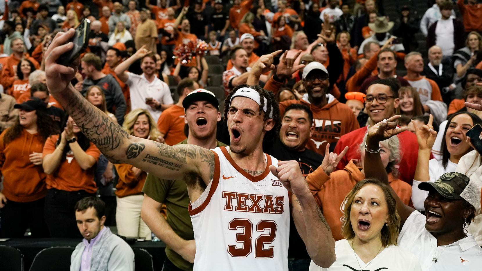 Texas forward Christian Bishop celebrates after their win against Xavier in a Sweet 16...