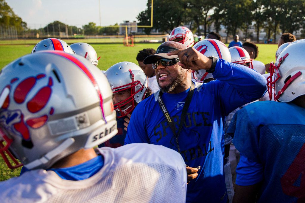 Spruce High School head football coach Carl Richardson coaches football practice on Wednesday, September 19, 2018 at Spruce High School in Dallas. (Ashley Landis/The Dallas Morning News)