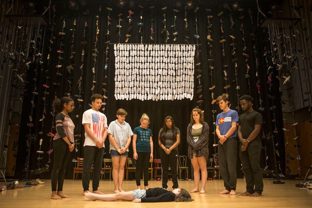 Maren Bennett, 10, is surrounded in Cry Havoc Theater Company's Babel, an original show...