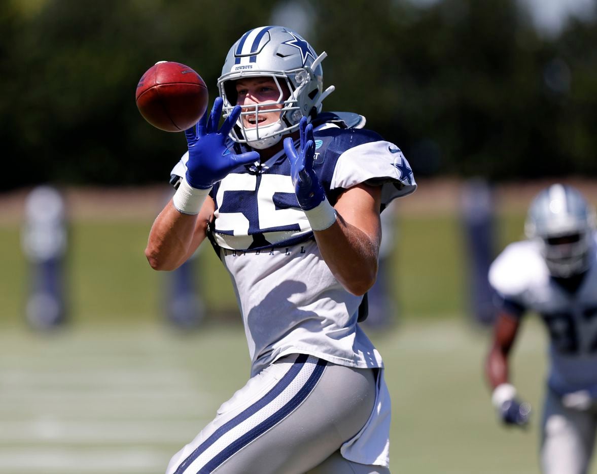 Dallas Cowboys linebacker Leighton Vander Esch (55) catches a throw during a Training Camp drills at The Star in Frisco, Texas, Tuesday, August 24, 2021.(Tom Fox/The Dallas Morning News)