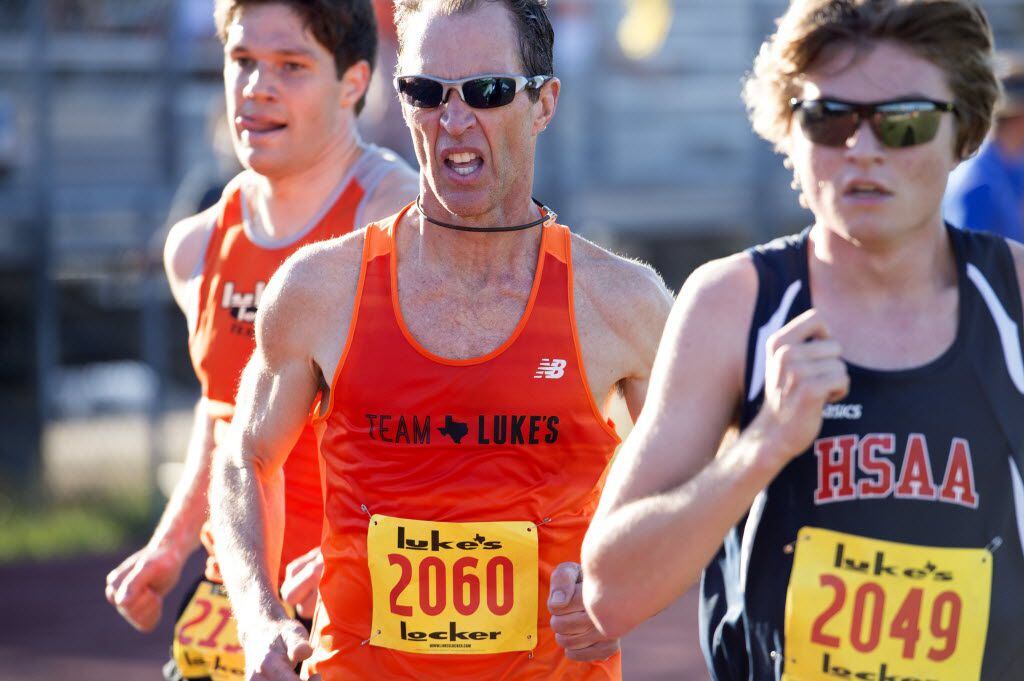 Former Dallas White Rock Marathon winner William Moore, 54, runs the 1 mile race in the...