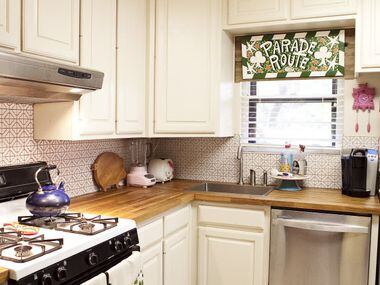 Instead of a traditional window covering over the kitchen windonw, Markus and Lilly Neubauer...