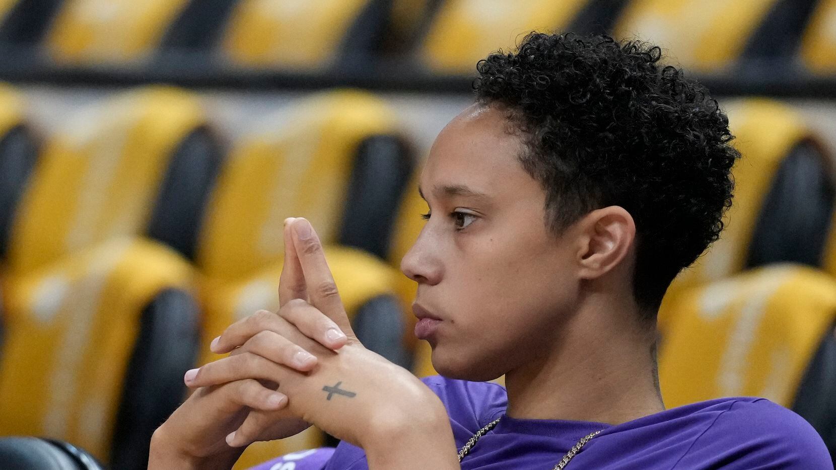 Phoenix Mercury center Brittney Griner looks at the court before a WNBA basketball game...