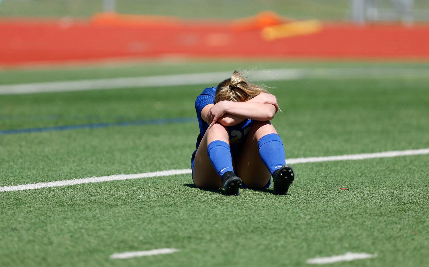 Frisco's Ava Yoas reacts after the 5A Region II semifinal girls soccer game against Highland...