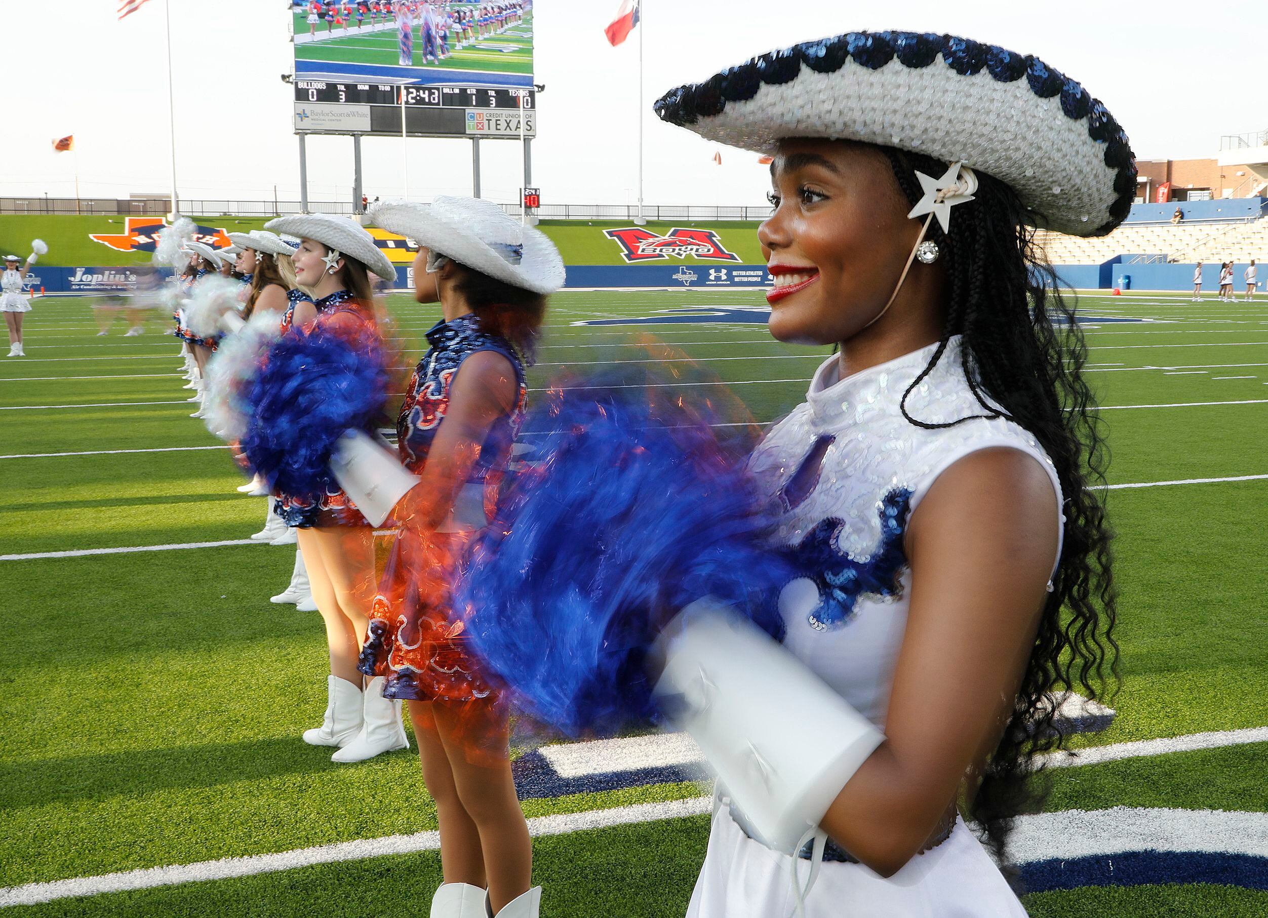 Mya Booker, 16, performs with the McKinney North High School Northstars drill team before...