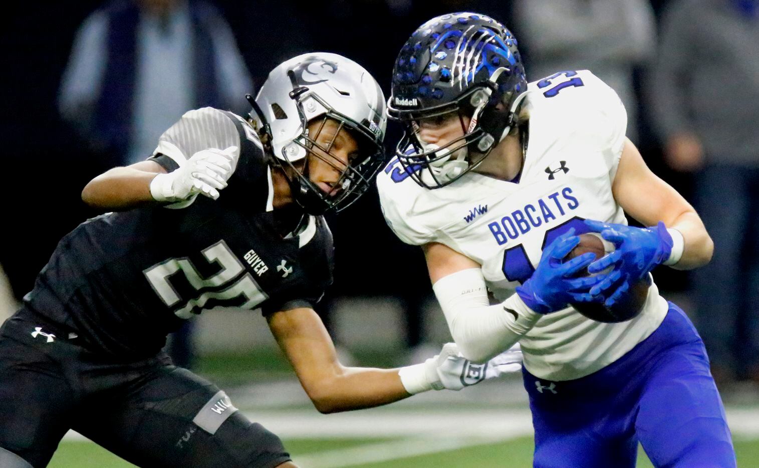 Byron Nelson High School wide receiver Gavin Mccurley (13) makes a catch in front of Guyer High School free safety Brenden Bradshaw (20) during the first half as Denton Guyer High School played Trophy Club Byron Nelson High School in a Class 6A Division II Region I semifinal football game at The Ford Center in Frisco on Saturday, November 27, 2021. (Stewart F. House/Special Contributor)