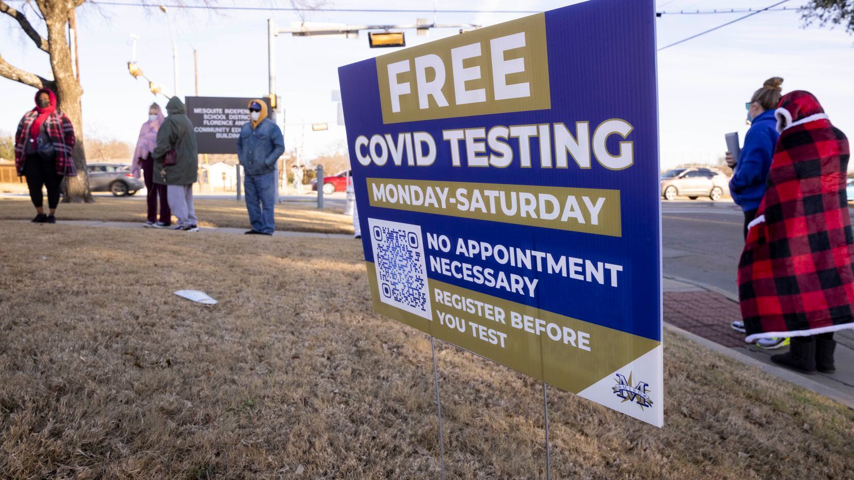 People wait in line to receive free COVID testing from Mesquite ISD Health Services on Jan....