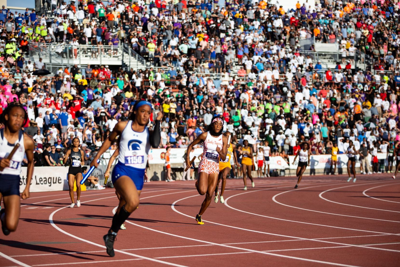 Lancaster’s Trelondra Strong runs in the girls’ 4x200 relay final at the UIL Track & Field...