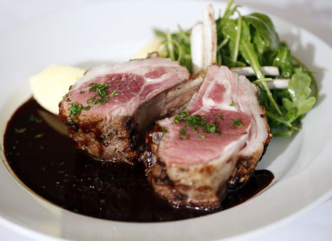 Grilled lamb chops, arugula salad and mashed potatoes in a red wine sauce at Le Bilboquet...