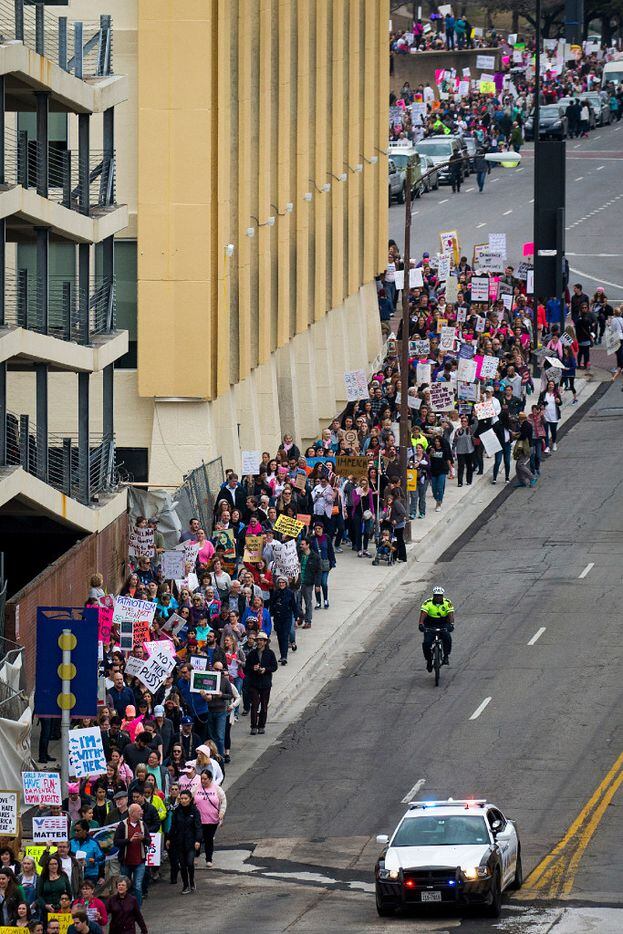 The Dallas Women's March kicked off along Young Street at Dallas City Hall on Saturday. 