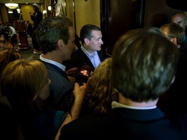 Ted Cruz departs after speaking at the Republican Party of Texas delegation breakfast on day...